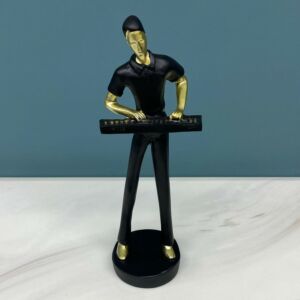 تحفة موسيقار عازف أورغ - أسود وذهبي